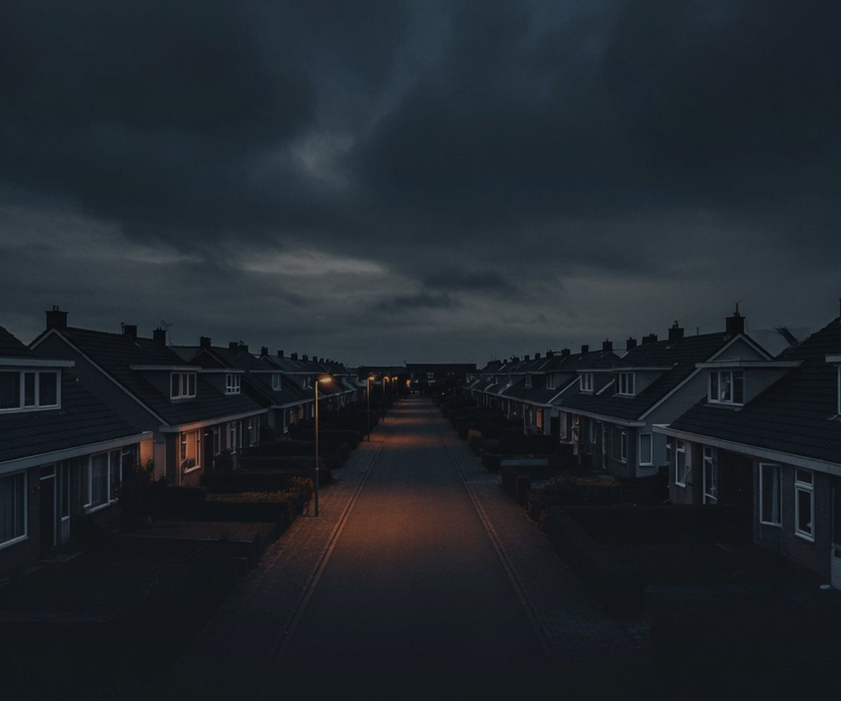 Quiet residential street at dusk representing buying your first home in a tight market