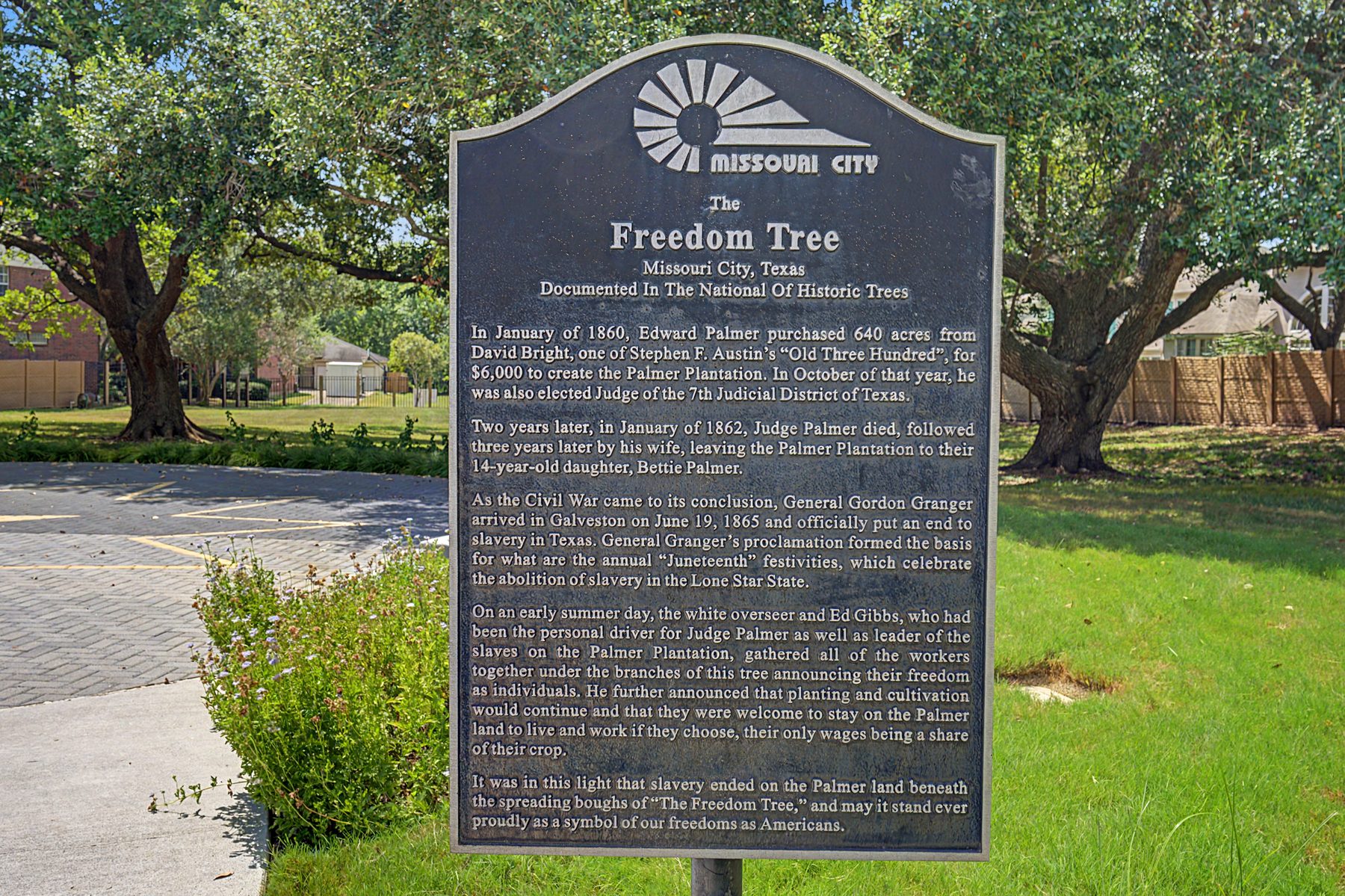 City of Missouri City historical marker telling the story of the Freedom Tree